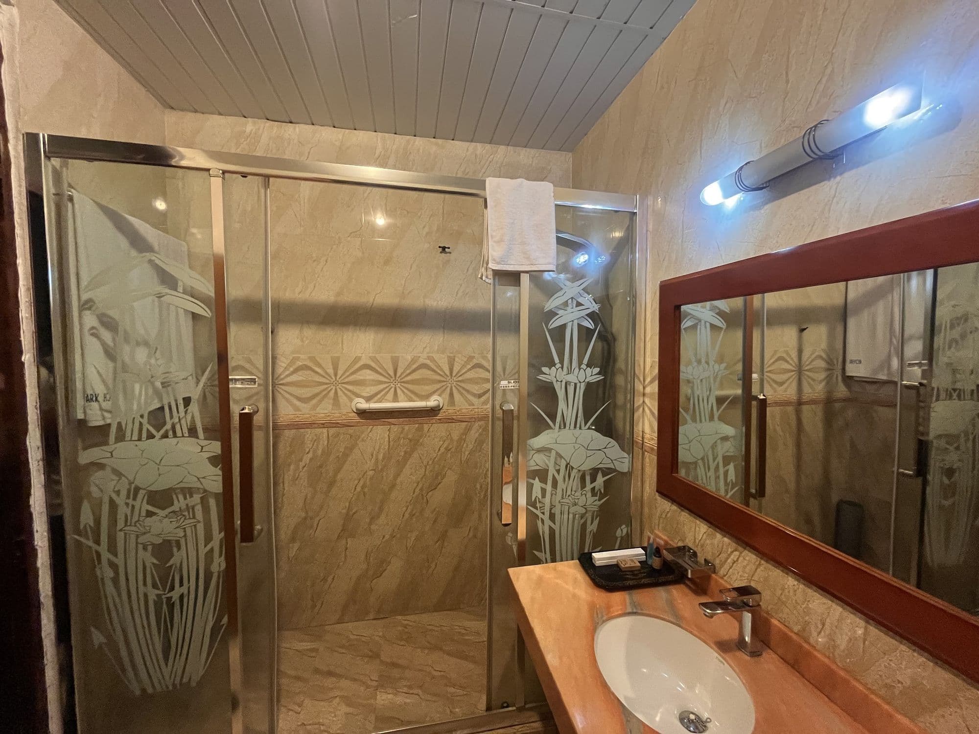 En-suite bathroom with glass shower
